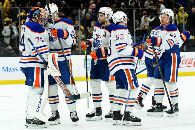 Jan 7, 2025; Boston, Massachusetts, USA;  The Edmonton Oilers celebrate after defeating the Boston Bruins at TD Garden. Mandatory Credit: Bob DeChiara-Imagn Images