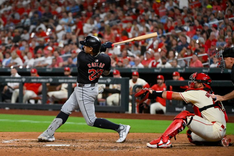 Sep 21, 2024; St. Louis, Missouri, USA;  Cleveland Guardians catcher Bo Naylor (23) hits a solo home run against the St. Louis Cardinals during the fifth inning at Busch Stadium. Mandatory Credit: Jeff Curry-Imagn Images