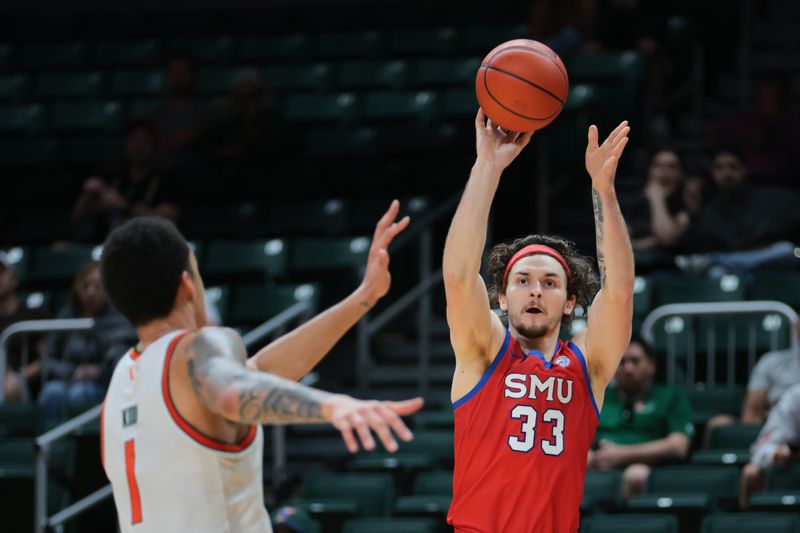 Jan 18, 2025; Coral Gables, Florida, USA; Southern Methodist Mustangs forward Matt Cross (33) shoots the basketball over Miami Hurricanes center Lynn Kidd (1) during the second half at Watsco Center. Mandatory Credit: Sam Navarro-Imagn Images