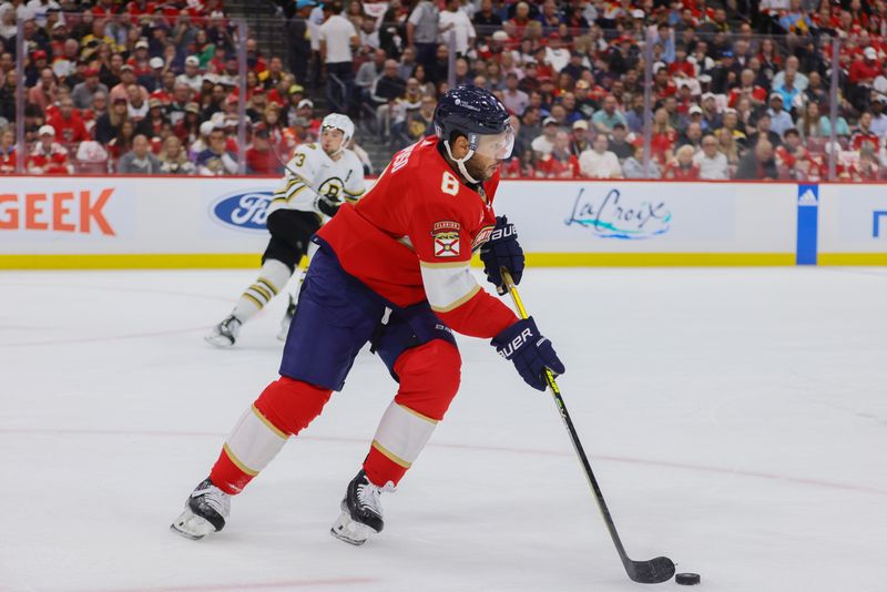 May 14, 2024; Sunrise, Florida, USA; Florida Panthers right wing Kyle Okposo (8) moves the puck against the Boston Bruins during the first period in game five of the second round of the 2024 Stanley Cup Playoffs at Amerant Bank Arena. Mandatory Credit: Sam Navarro-USA TODAY Sports