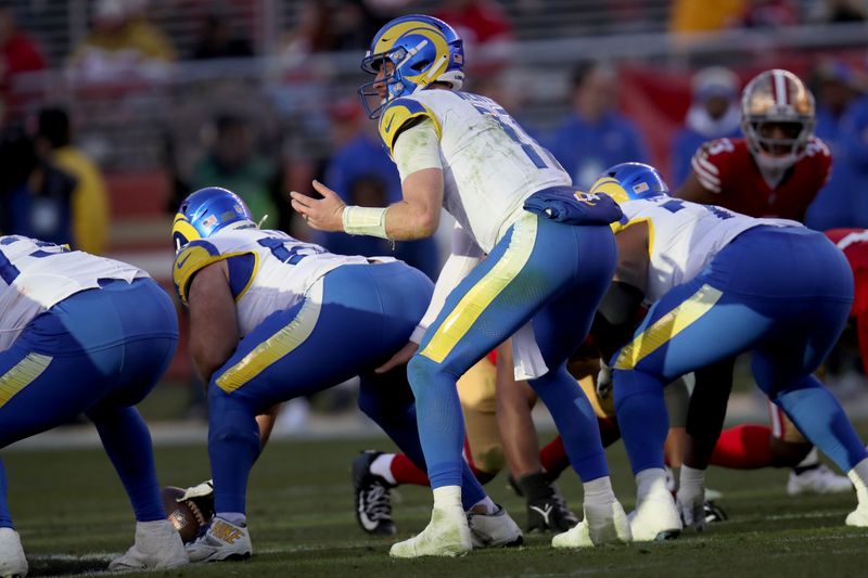 Los Angeles Rams quarterback Carson Wentz (11) gestures during an NFL football game against the San Francisco 49ers, Monday, Jan. 7, 2024, in Santa Clara, Calif. (AP Photo/Scot Tucker)