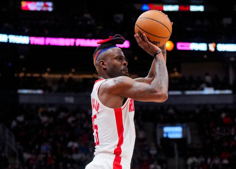 TORONTO, ON - FEBRUARY 9: Reggie Bullock #25 of the Houston Rockets shoots against the Toronto Raptors during the second half of their basketball game at the Scotiabank Arena on February 9, 2024 in Toronto, Ontario, Canada. NOTE TO USER: User expressly acknowledges and agrees that, by downloading and/or using this Photograph, user is consenting to the terms and conditions of the Getty Images License Agreement. (Photo by Mark Blinch/Getty Images)