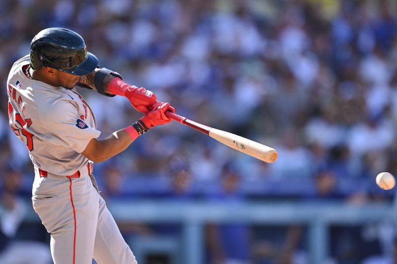 Jul 21, 2024; Los Angeles, California, USA; Boston Red Sox outfielder Ceddanne Rafaela (43) grounds out to first base against the Los Angeles Dodgers during the fourth inning at Dodger Stadium. Mandatory Credit: Jonathan Hui-USA TODAY Sports