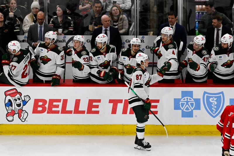 1Apr 7, 2024; Chicago, Illinois, USA;  Minnesota Wild left wing Kirill Kaprizov (97) celebrates his goal against the Chicago Blackhawks  during the second period at United Center. Mandatory Credit: Matt Marton-USA TODAY Sports