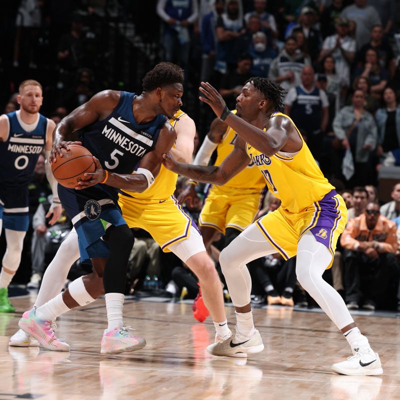 MINNEAPOLIS, MN -  APRIL 25:    Anthony Edwards #5 of the Minnesota Timberwolves dribbles the ball during the game against the Los Angeles Lakers  during Round 1 Game 3 of the 2025 NBA Playoffs  on April 25, 2025 at Target Center in Minneapolis, Minnesota. NOTE TO USER: User expressly acknowledges and agrees that, by downloading and or using this Photograph, user is consenting to the terms and conditions of the Getty Images License Agreement. Mandatory Copyright Notice: Copyright 2025 NBAE (Photo by David Sherman/NBAE via Getty Images)