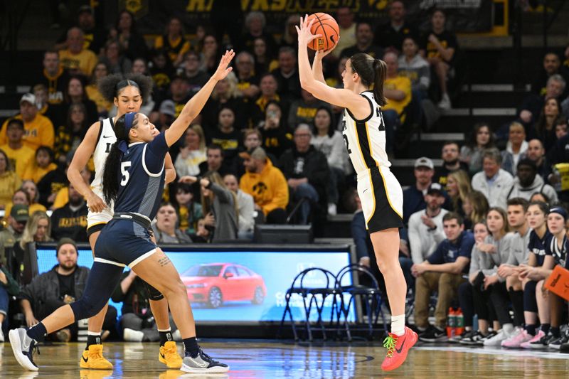 Feb 8, 2024; Iowa City, Iowa, USA; Iowa Hawkeyes guard Caitlin Clark (22) shoots a three point basket over Penn State Nittany Lions guard Leilani Kapinus (5) during the first half at Carver-Hawkeye Arena. Mandatory Credit: Jeffrey Becker-USA TODAY Sports