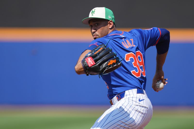 Mar 17, 2024; Port St. Lucie, Florida, USA;  New York Mets relief pitcher Edwin Diaz (39) warms-up in the seventh inning against the Miami Marlins at Clover Park. Mandatory Credit: Jim Rassol-USA TODAY Sports 