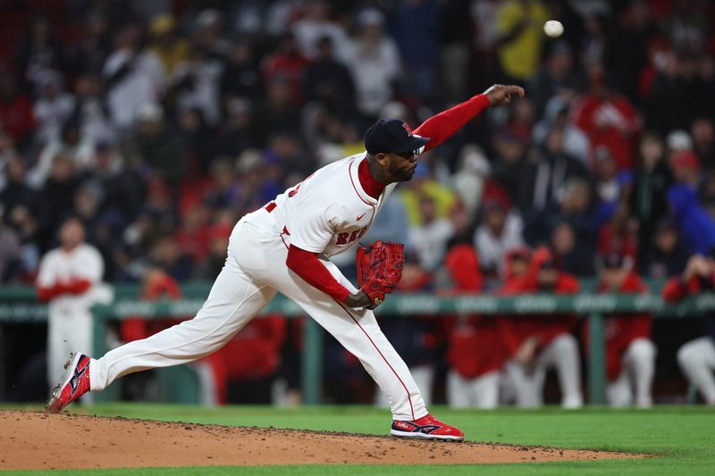 May 20, 2025; Boston, Massachusetts, USA; Boston Red Sox relief pitcher Aroldis Chapman (44) delivers a pitch during the ninth inning against the New York Mets at Fenway Park. Mandatory Credit: Paul Rutherford-Imagn Images