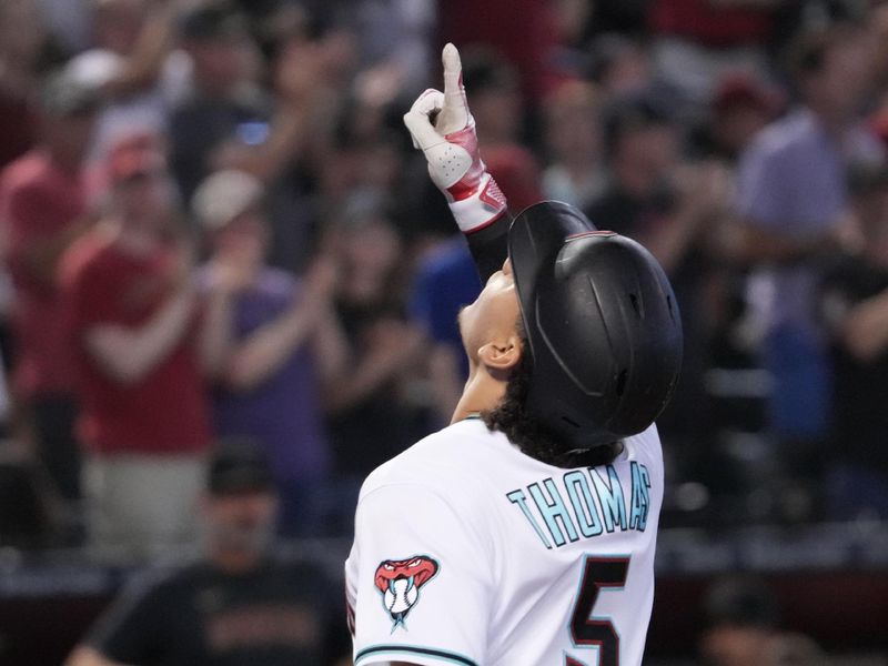 Jul 8, 2023; Phoenix, Arizona, USA; Arizona Diamondbacks center fielder Alek Thomas (5) celebrates after hitting a solo home run against the Pittsburgh Pirates during the eighth inning at Chase Field. Mandatory Credit: Joe Camporeale-USA TODAY Sports