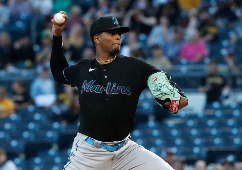 Sep 29, 2023; Pittsburgh, Pennsylvania, USA;  Miami Marlins starting pitcher Edward Cabrera (27) delivers a pitch against the Pittsburgh Pirates during the first inning at PNC Park. Mandatory Credit: Charles LeClaire-USA TODAY Sports