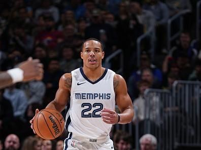 DENVER, CO - DECEMBER 28: Desmond Bane #22 of the Memphis Grizzlies brings the ball up court against the Denver Nuggets on December 28, 2023 at the Ball Arena in Denver, Colorado. NOTE TO USER: User expressly acknowledges and agrees that, by downloading and/or using this Photograph, user is consenting to the terms and conditions of the Getty Images License Agreement. Mandatory Copyright Notice: Copyright 2023 NBAE (Photo by Garrett Ellwood/NBAE via Getty Images)