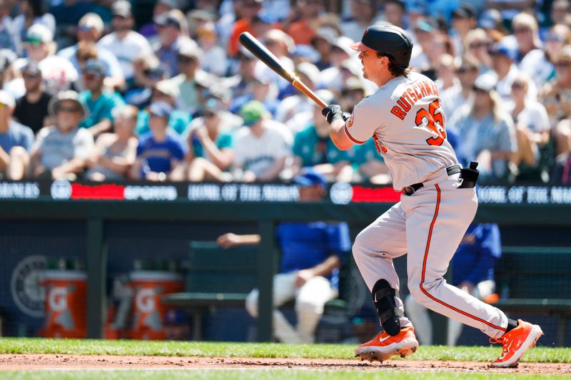 Aug 13, 2023; Seattle, Washington, USA; Baltimore Orioles designated hitter Adley Rutschman (35) hits a single against the Seattle Mariners during the third inning at T-Mobile Park. Mandatory Credit: Joe Nicholson-USA TODAY Sports