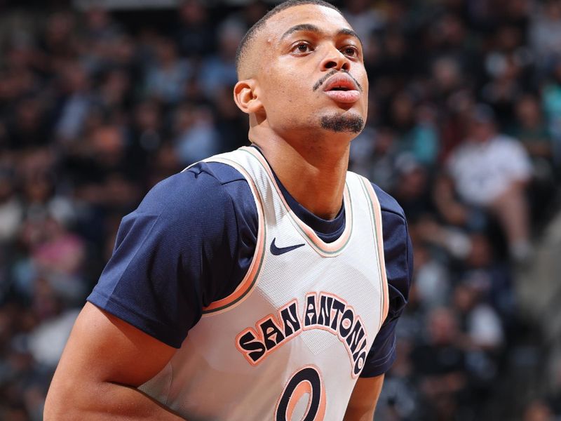 SAN ANTONIO, TX - NOVEMBER 27: Keldon Johnson #0 of the San Antonio Spurs prepares to shoot a free throw during the game against the Los Angeles Lakers on November 27, 2024 at the Frost Bank Center in San Antonio, Texas. NOTE TO USER: User expressly acknowledges and agrees that, by downloading and or using this photograph, user is consenting to the terms and conditions of the Getty Images License Agreement. Mandatory Copyright Notice: Copyright 2024 NBAE (Photos by Jeff Haynes/NBAE via Getty Images)