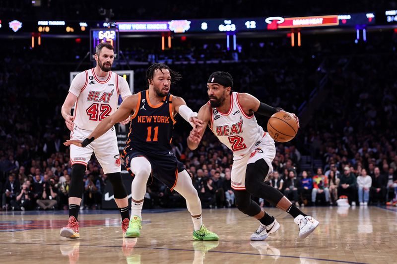 NEW YORK, NEW YORK - MARCH 29: Gabe Vincent #2 of the Miami Heat is guarded by Jalen Brunson #11 of the New York Knicks during the first quarter of the game at Madison Square Garden on March 29, 2023 in New York City. NOTE TO USER: User expressly acknowledges and agrees that, by downloading and or using this photograph, User is consenting to the terms and conditions of the Getty Images License Agreement. (Photo by Dustin Satloff/Getty Images)