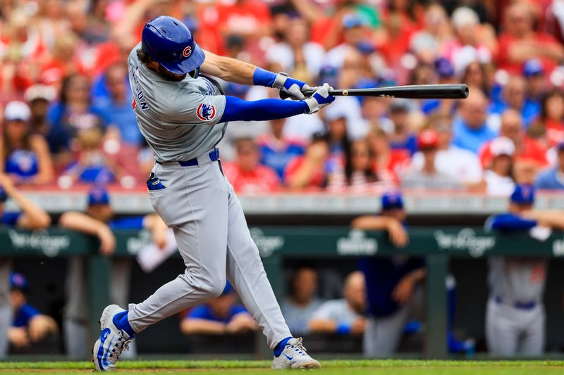 Jun 8, 2024; Cincinnati, Ohio, USA; Chicago Cubs shortstop Dansby Swanson (7) hits a RBI double against the Cincinnati Reds in the first inning at Great American Ball Park. Mandatory Credit: Katie Stratman-USA TODAY Sports