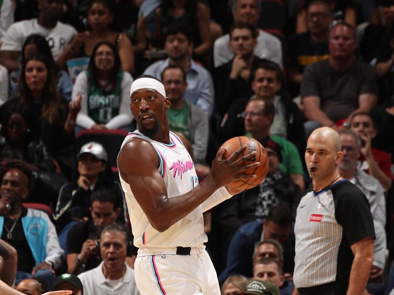 MIAMI, FL - FEBRUARY 10:  Bam Adebayo #13 of the Miami Heat handles the ball during the game against the Boston Celtics on February 10, 2025 at Kaseya Center in Miami, Florida. NOTE TO USER: User expressly acknowledges and agrees that, by downloading and or using this Photograph, user is consenting to the terms and conditions of the Getty Images License Agreement. Mandatory Copyright Notice: Copyright 2025 NBAE (Photo by Issac Baldizon/NBAE via Getty Images)