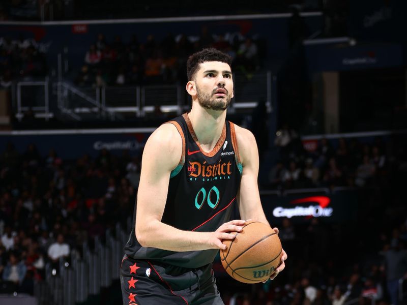 WASHINGTON, DC -? APRIL 5: Tristan Vukcevic #00 of the Washington Wizards shoots a free throw during the game against the Portland Trail Blazers  on April 5, 2024 at Capital One Arena in Washington, DC. NOTE TO USER: User expressly acknowledges and agrees that, by downloading and or using this Photograph, user is consenting to the terms and conditions of the Getty Images License Agreement. Mandatory Copyright Notice: Copyright 2024 NBAE (Photo by Kenny Giarla/NBAE via Getty Images)