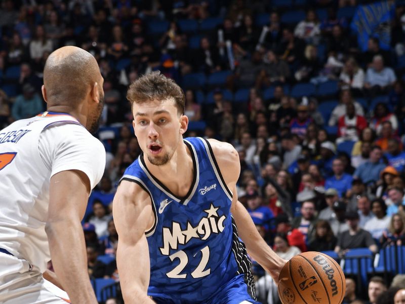 ORLANDO, FL - FEBRUARY 14: Franz Wagner #22 of the Orlando Magic dribbles the ball during the game against the New York Knicks on February 14, 2024 at the Kia Center in Orlando, Florida. NOTE TO USER: User expressly acknowledges and agrees that, by downloading and or using this photograph, User is consenting to the terms and conditions of the Getty Images License Agreement. Mandatory Copyright Notice: Copyright 2024 NBAE (Photo by Fernando Medina/NBAE via Getty Images)