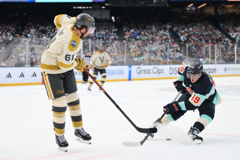 Jan 1, 2024; Seattle, Washington, USA; Vegas Golden Knights right wing Mark Stone (61) passes the puck between the legs of Seattle Kraken left wing Jared McCann (19) during the 3rd period in the 2024 Winter Classic ice hockey game at T-Mobile Park. Mandatory Credit: Steven Bisig-USA TODAY Sports