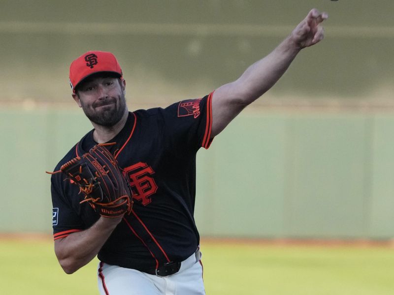 Mar 18, 2025; Scottsdale, Arizona, USA; San Francisco Giants pitcher Robbie Ray (38) throws against the San Diego Padres in the first inning at Scottsdale Stadium. Mandatory Credit: Rick Scuteri-Imagn Images