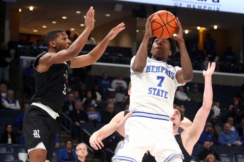 Jan 31, 2024; Memphis, Tennessee, USA; Memphis Tigers forward Nae'Qwan Tomlin (7) drives to the basket as Memphis Tigers center Jordan Brown (3) defends during the first half at FedExForum. Mandatory Credit: Petre Thomas-USA TODAY Sports