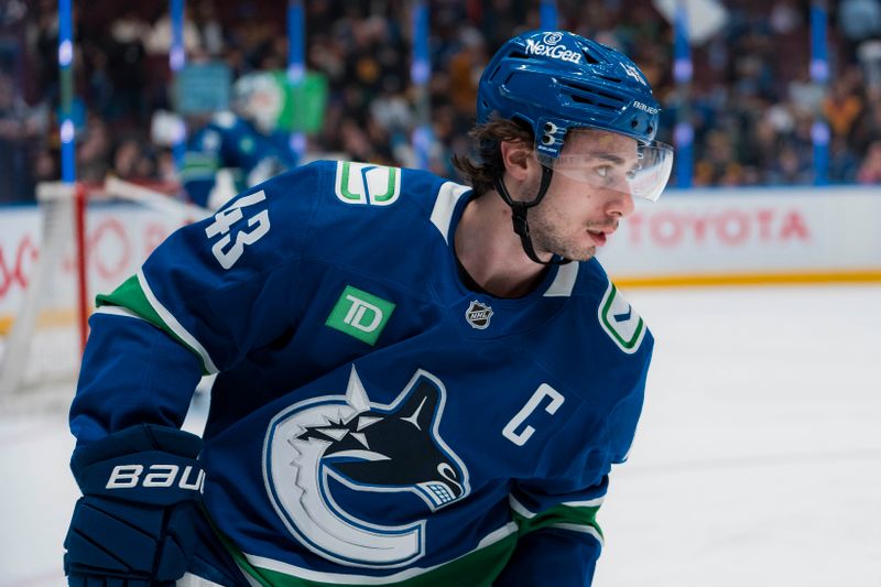 Mar 18, 2025; Vancouver, British Columbia, CAN; Vancouver Canucks defenseman Quinn Hughes (43) skates during warm up prior to a game against the Winnipeg Jets at Rogers Arena.  Mandatory Credit: Bob Frid-Imagn Images