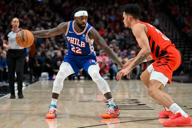 PORTLAND, OREGON - JANUARY 29: Patrick Beverley #22 of the Philadelphia 76ers dribbles against Toumani Camara #33 of the Portland Trail Blazers during the fourth quarter at the Moda Center on January 29, 2024 in Portland, Oregon. The Portland Trail Blazers won 130-104. NOTE TO USER: User expressly acknowledges and agrees that, by downloading and or using this photograph, User is consenting to the terms and conditions of the Getty Images License Agreement. (Photo by Alika Jenner/Getty Images)