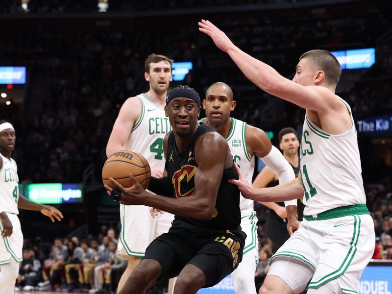 CLEVELAND, OH - MARCH 5: Caris LeVert #3 of the Cleveland Cavaliers drives to the basket during the game against the Boston Celtics on March 5, 2024 at Rocket Mortgage FieldHouse in Cleveland, Ohio. NOTE TO USER: User expressly acknowledges and agrees that, by downloading and/or using this Photograph, user is consenting to the terms and conditions of the Getty Images License Agreement. Mandatory Copyright Notice: Copyright 2024 NBAE (Photo by Lauren Leigh Bacho<p><br/></p>/NBAE via Getty Images)