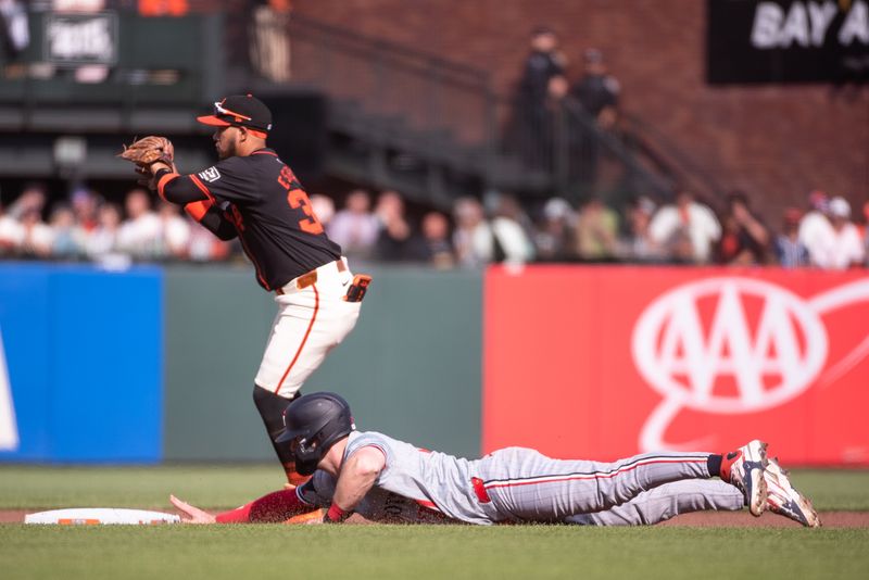 Jul 13, 2024; San Francisco, California, USA; Minnesota Twins catcher Ryan Jeffers (27) slides into second base during the fourth inning of the game against the San Francisco Giants at Oracle Park. Mandatory Credit: Ed Szczepanski-USA TODAY Sports