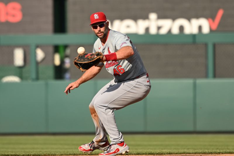 Jul 8, 2024; Washington, District of Columbia, USA; St. Louis Cardinals first baseman Paul Goldschmidt (46) fields a ground ball against the Washington Nationals during the eighth inning at Nationals Park. Mandatory Credit: Rafael Suanes-USA TODAY Sports