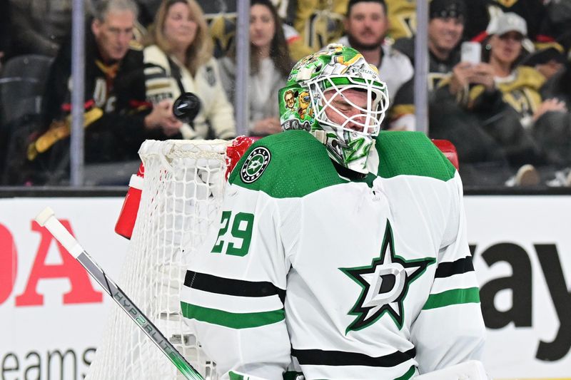 Apr 27, 2024; Las Vegas, Nevada, USA; Dallas Stars goaltender Jake Oettinger (29) stops a shot from the Vegas Golden Knights in the third period in game three of the first round of the 2024 Stanley Cup Playoffs at T-Mobile Arena. Mandatory Credit: Candice Ward-USA TODAY Sports