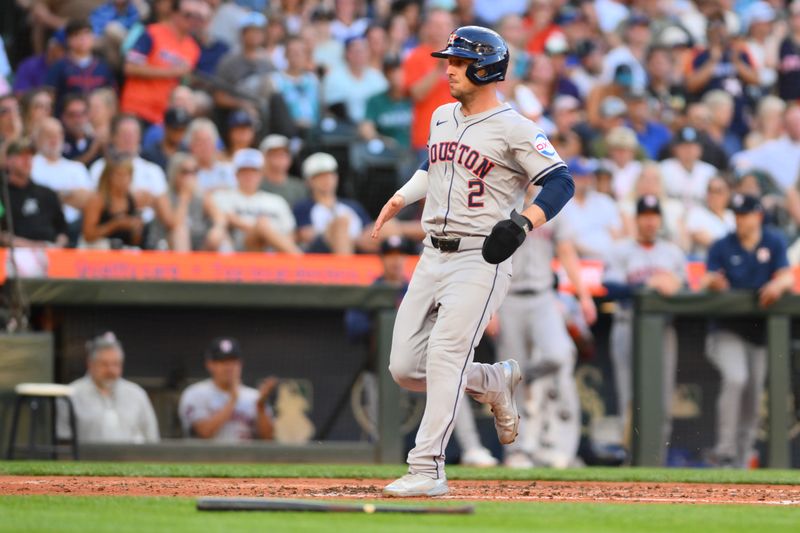 Jul 19, 2024; Seattle, Washington, USA; Houston Astros third baseman Alex Bregman (2) scores a run against the Seattle Mariners during the third inning at T-Mobile Park. Mandatory Credit: Steven Bisig-USA TODAY Sports