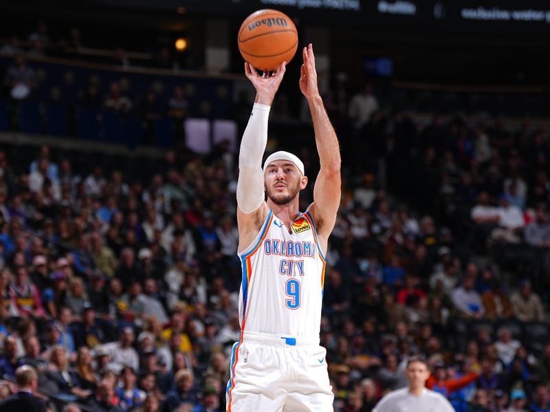 DENVER, CO - NOVEMBER 6: Alex Caruso #9 of the Oklahoma City Thunder shoots the ball during the game against the Denver Nuggets on November 6, 2024 at Ball Arena in Denver, Colorado. NOTE TO USER: User expressly acknowledges and agrees that, by downloading and/or using this Photograph, user is consenting to the terms and conditions of the Getty Images License Agreement. Mandatory Copyright Notice: Copyright 2024 NBAE (Photo by Garrett Ellwood/NBAE via Getty Images)