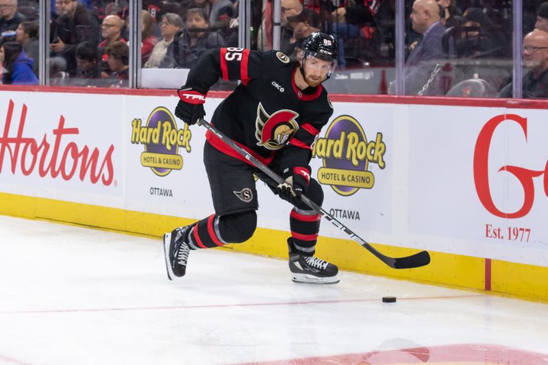 Nov 14, 2024; Ottawa, Ontario, CAN: Ottawa Senators defenseman Jake Sanderson (85) skates with the puck in the second period against the Philadelphia Flyers at the Canadian Tire Centre. Mandatory Credit: Marc DesRosiers-Imagn Images