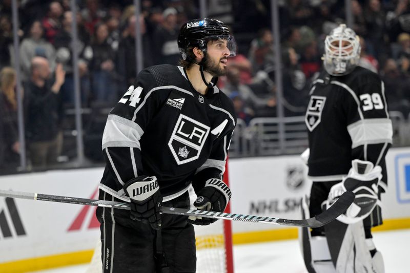 Mar 3, 2024; Los Angeles, California, USA; Los Angeles Kings center Phillip Danault (24) is congratulated by goaltender Cam Talbot (39) after scoring a hat trick in the third period against the New Jersey Devils at Crypto.com Arena. Mandatory Credit: Jayne Kamin-Oncea-USA TODAY Sports