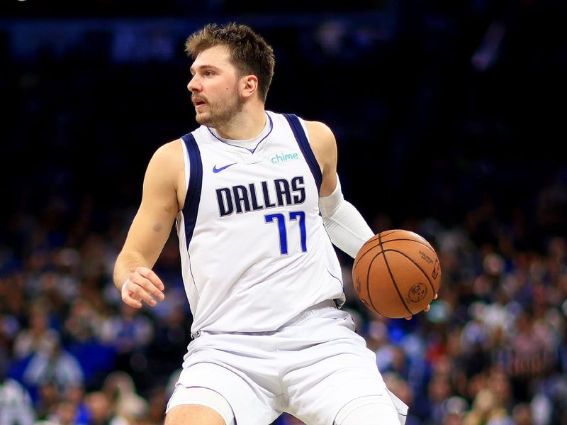 ORLANDO, FLORIDA - NOVEMBER 06: Luka Doncic #77 of the Dallas Mavericks brings the ball up the floor during a game against the Orlando Magic at Amway Center on November 06, 2023 in Orlando, Florida. (Photo by Mike Ehrmann/Getty Images) NOTE TO USER: User expressly acknowledges and agrees that, by downloading and or using this photograph, User is consenting to the terms and conditions of the Getty Images License Agreement. (Photo by Mike Ehrmann/Getty Images)