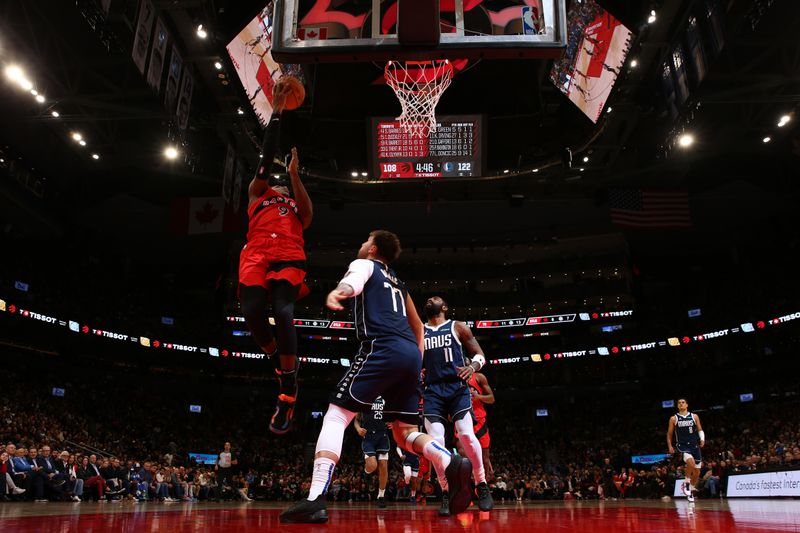 TORONTO, CANADA - FEBRUARY 28: RJ Barrett #9 of the Toronto Raptors drives to the basket during the game against the Dallas Mavericks on February 28, 2024 at the Scotiabank Arena in Toronto, Ontario, Canada.  NOTE TO USER: User expressly acknowledges and agrees that, by downloading and or using this Photograph, user is consenting to the terms and conditions of the Getty Images License Agreement.  Mandatory Copyright Notice: Copyright 2024 NBAE (Photo by Vaughn Ridley/NBAE via Getty Images)