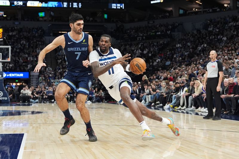 MINNEAPOLIS, MN -  JANUARY 11: Naz Reid #11 of the Minnesota Timber wolves drives to the basket during the game against the Memphis Grizzlies on January 11, 2025 at Target Center in Minneapolis, Minnesota. NOTE TO USER: User expressly acknowledges and agrees that, by downloading and or using this Photograph, user is consenting to the terms and conditions of the Getty Images License Agreement. Mandatory Copyright Notice: Copyright 2025 NBAE (Photo by Jordan Johnson/NBAE via Getty Images)