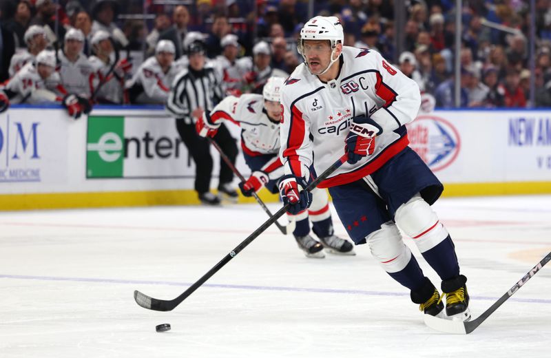 Jan 6, 2025; Buffalo, New York, USA;  Washington Capitals left wing Alex Ovechkin (8) skates with the puck during the third period against the Buffalo Sabres at KeyBank Center. Mandatory Credit: Timothy T. Ludwig-Imagn Images