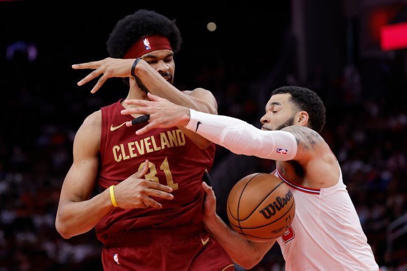 HOUSTON, TEXAS - MARCH 16: Fred VanVleet #5 of the Houston Rockets defends Jarrett Allen #31 of the Cleveland Cavaliers during the first half at Toyota Center on March 16, 2024 in Houston, Texas. NOTE TO USER: User expressly acknowledges and agrees that, by downloading and or using this photograph, User is consenting to the terms and conditions of the Getty Images License Agreement. (Photo by Carmen Mandato/Getty Images)