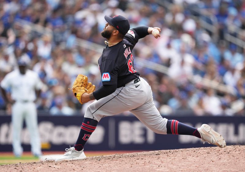 Jun 15, 2024; Toronto, Ontario, CAN; Cleveland Guardians relief pitcher Pedro Avila (60) throws a pitch against the Toronto Blue Jays during the eighth inning at Rogers Centre. Mandatory Credit: Nick Turchiaro-USA TODAY Sports