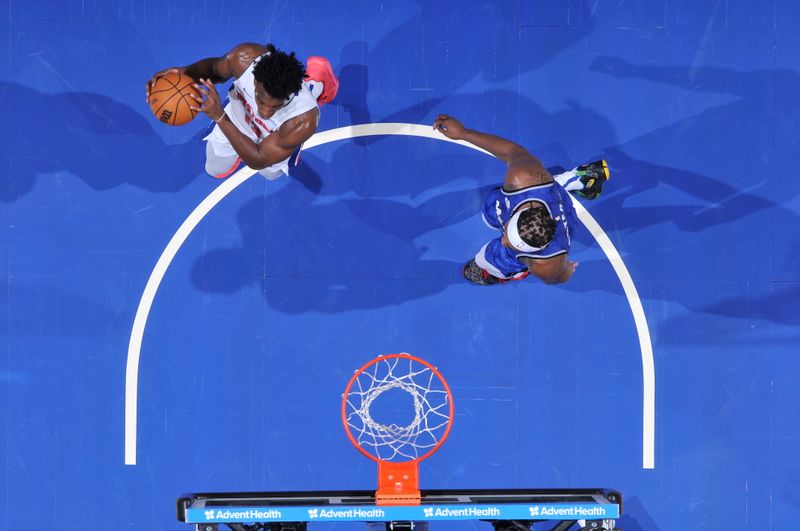 ORLANDO, FL - MARCH 3: James Wiseman #13 of the Detroit Pistons drives to the basket during the game against the Orlando Magic on March 3, 2024 at the Kia Center in Orlando, Florida. NOTE TO USER: User expressly acknowledges and agrees that, by downloading and or using this photograph, User is consenting to the terms and conditions of the Getty Images License Agreement. Mandatory Copyright Notice: Copyright 2024 NBAE (Photo by Fernando Medina/NBAE via Getty Images)