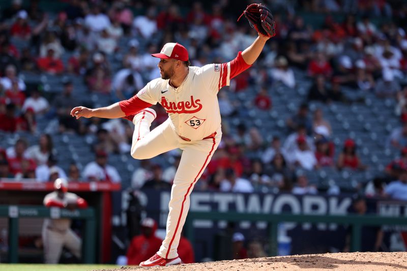 Jun 9, 2024; Anaheim, California, USA;  Los Angeles Angels relief pitcher Carlos Estevez (53) pitches during the ninth inning against the Houston Astros at Angel Stadium. Mandatory Credit: Kiyoshi Mio-USA TODAY Sports