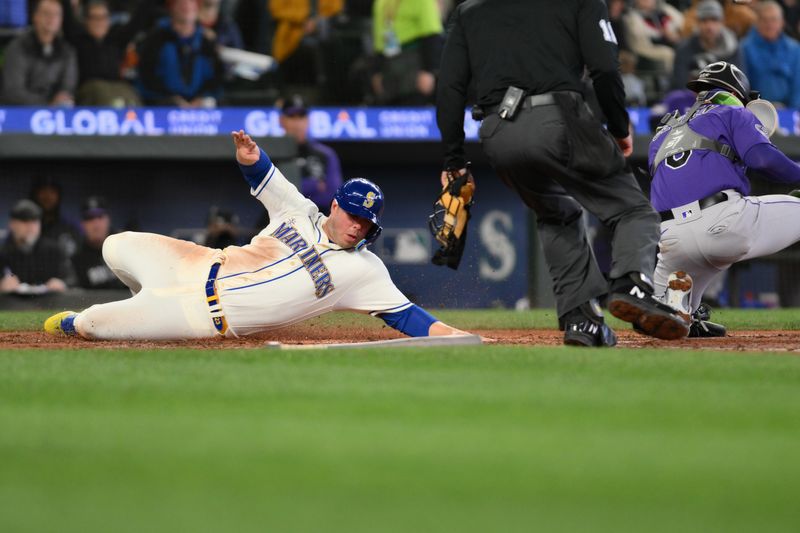 Apr 16, 2023; Seattle, Washington, USA; Seattle Mariners first baseman Ty France (23) scores a run off an RBI single hit by Seattle Mariners right fielder Jarred Kelenic (10) (not pictured) during the sixth inning at T-Mobile Park. Mandatory Credit: Steven Bisig-USA TODAY Sports