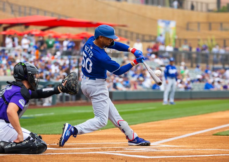 Feb 26, 2024; Salt River Pima-Maricopa, Arizona, USA; Los Angeles Dodgers infielder Mookie Betts against the Colorado Rockies during a spring training game at Salt River Fields at Talking Stick. Mandatory Credit: Mark J. Rebilas-USA TODAY Sports
