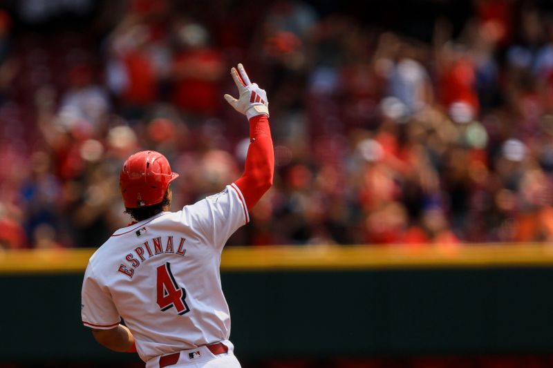 Aug 4, 2024; Cincinnati, Ohio, USA; Cincinnati Reds outfielder Santiago Espinal (4) runs the bases after hitting a solo home run in the second inning against the San Francisco Giants at Great American Ball Park. Mandatory Credit: Katie Stratman-USA TODAY Sports