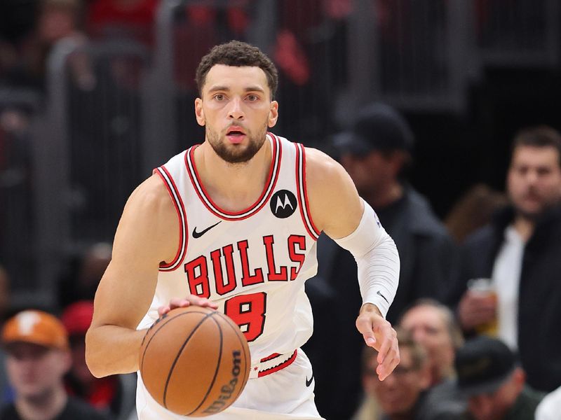 CHICAGO, ILLINOIS - NOVEMBER 06: Zach LaVine #8 of the Chicago Bulls dribbles up the court against the Utah Jazz during the first half at the United Center on November 06, 2023 in Chicago, Illinois. NOTE TO USER: User expressly acknowledges and agrees that, by downloading and or using this photograph, User is consenting to the terms and conditions of the Getty Images License Agreement. (Photo by Michael Reaves/Getty Images)