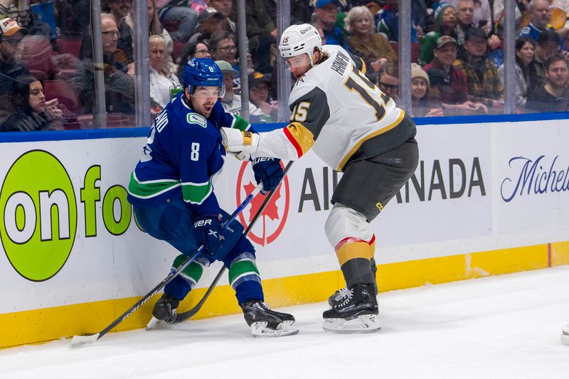 Apr 8, 2024; Vancouver, British Columbia, CAN; Vegas Golden Knights defenseman Noah Hanifin (15) checks Vancouver Canucks forward Conor Garland (8) in the first period  at Rogers Arena. Mandatory Credit: Bob Frid-USA TODAY Sports