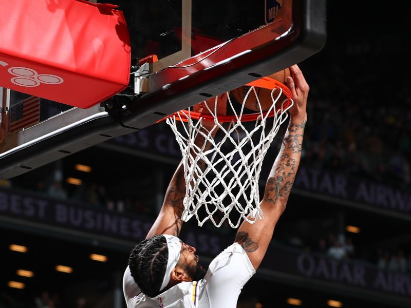 BROOKLYN, NY - MARCH 31: Anthony Davis #3 of the Los Angeles Lakers slam dunk during the game  on March 31, 2024 at Barclays Center in Brooklyn, New York. NOTE TO USER: User expressly acknowledges and agrees that, by downloading and or using this Photograph, user is consenting to the terms and conditions of the Getty Images License Agreement. Mandatory Copyright Notice: Copyright 2024 NBAE (Photo by David L. Nemec/NBAE via Getty Images)