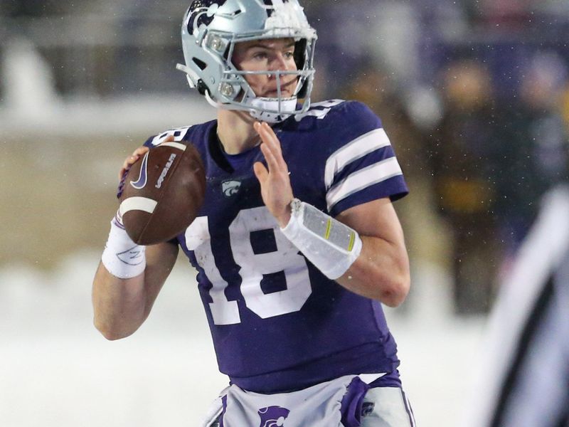 Nov 25, 2023; Manhattan, Kansas, USA; Kansas State Wildcats quarterback Will Howard (18) drops back to pass late in the fourth quarter against the Iowa State Cyclones at Bill Snyder Family Football Stadium. Mandatory Credit: Scott Sewell-USA TODAY Sports